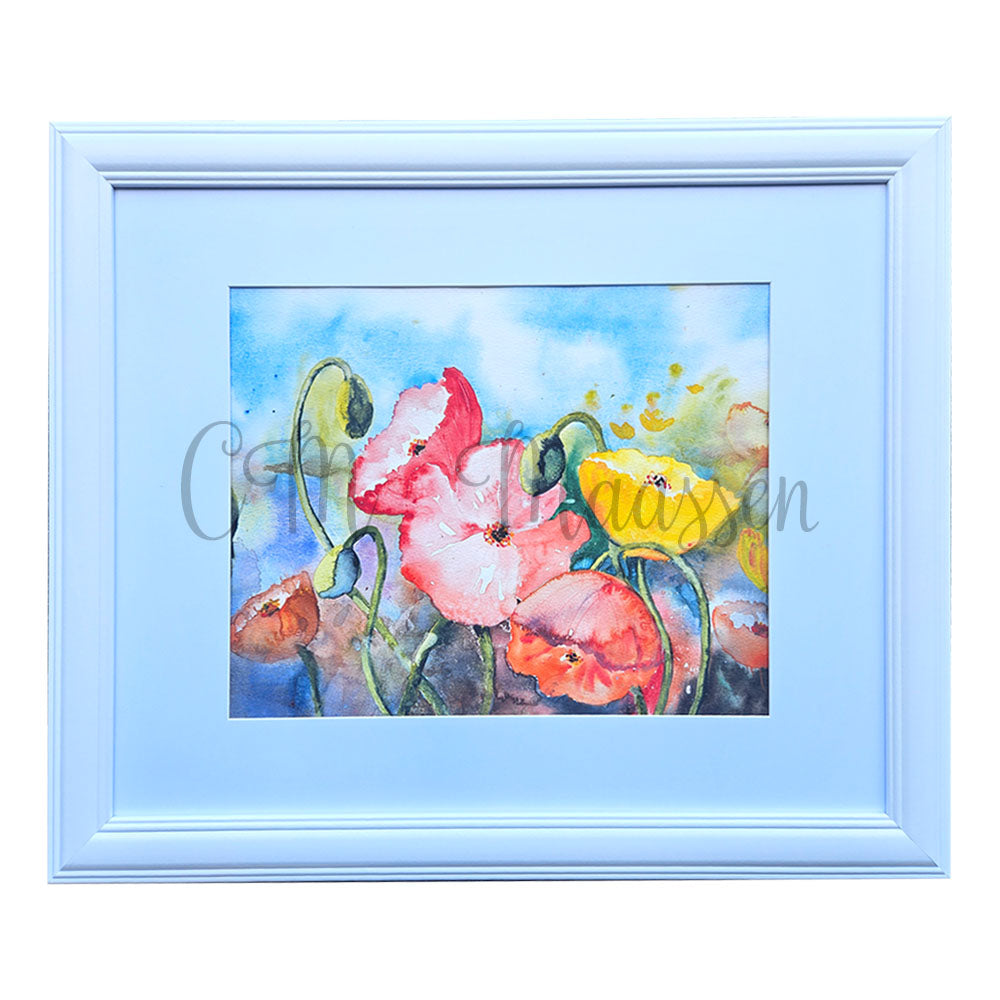 Framed watercolor painting of colorful flowers with a white border.