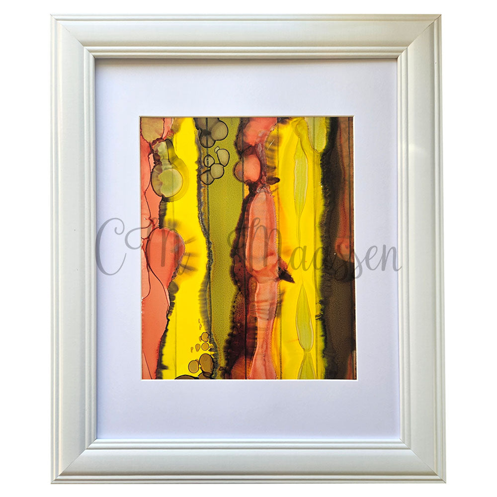 Framed abstract artwork with swirling colors on a white background