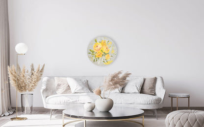 Modern living room with a white sofa, round coffee table, and decorative wall art.