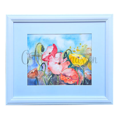 Framed watercolor painting of colorful flowers with a white border.