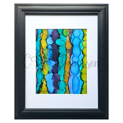 Framed abstract artwork with blue and yellow patterns on a white background